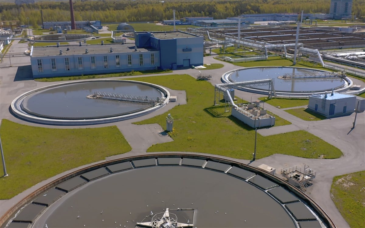 Aerial view of the wastewater treatment plant. Round sedimentation tanks. Radial primary pallet. Sediments of treatment facilities like MasTec's properties