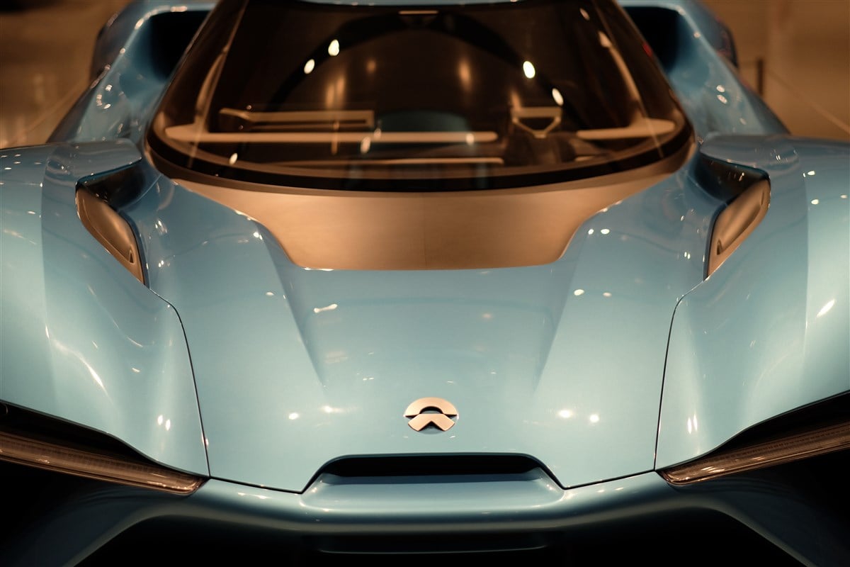 close-up of nio electric vehicle highlighting car logo