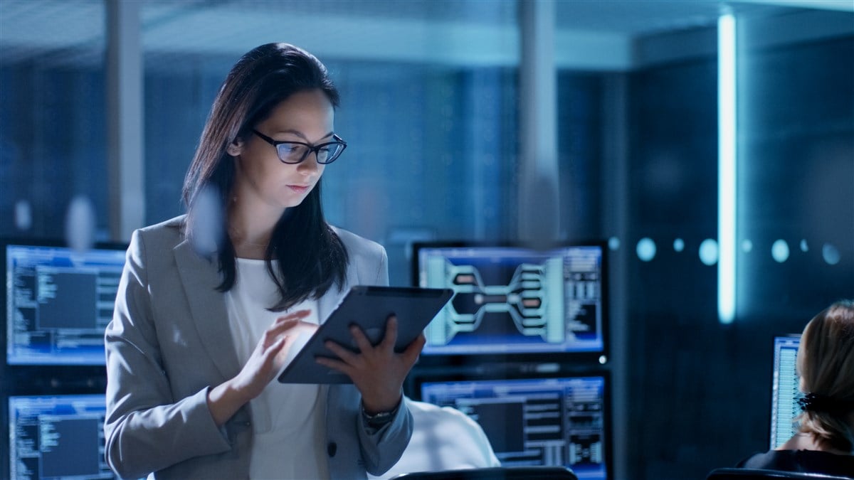 Photo of young woman with tablet in hand 