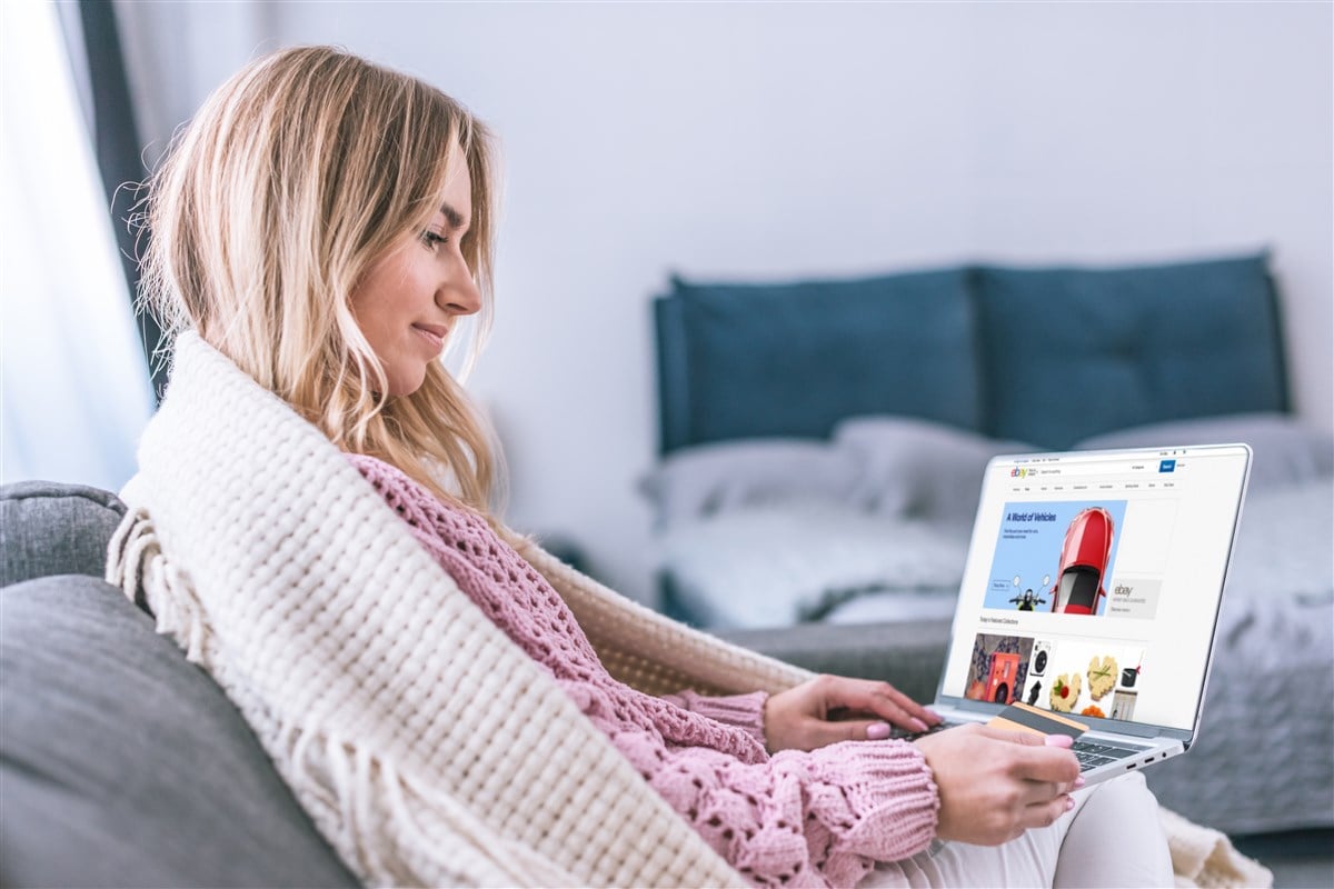 woman browsing ebay on laptop