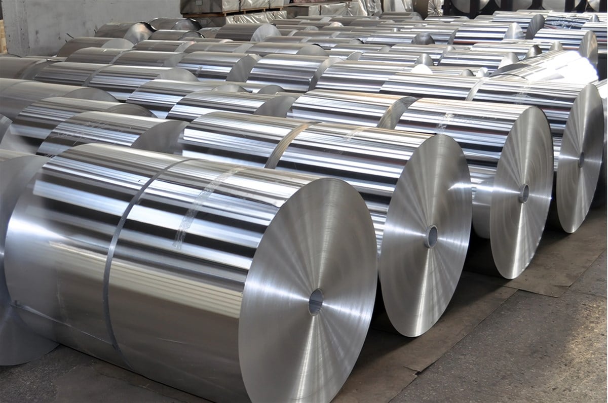 Photo of giant steel cylinders.  Nucor Earnings Rise on Steel Industry Trends.