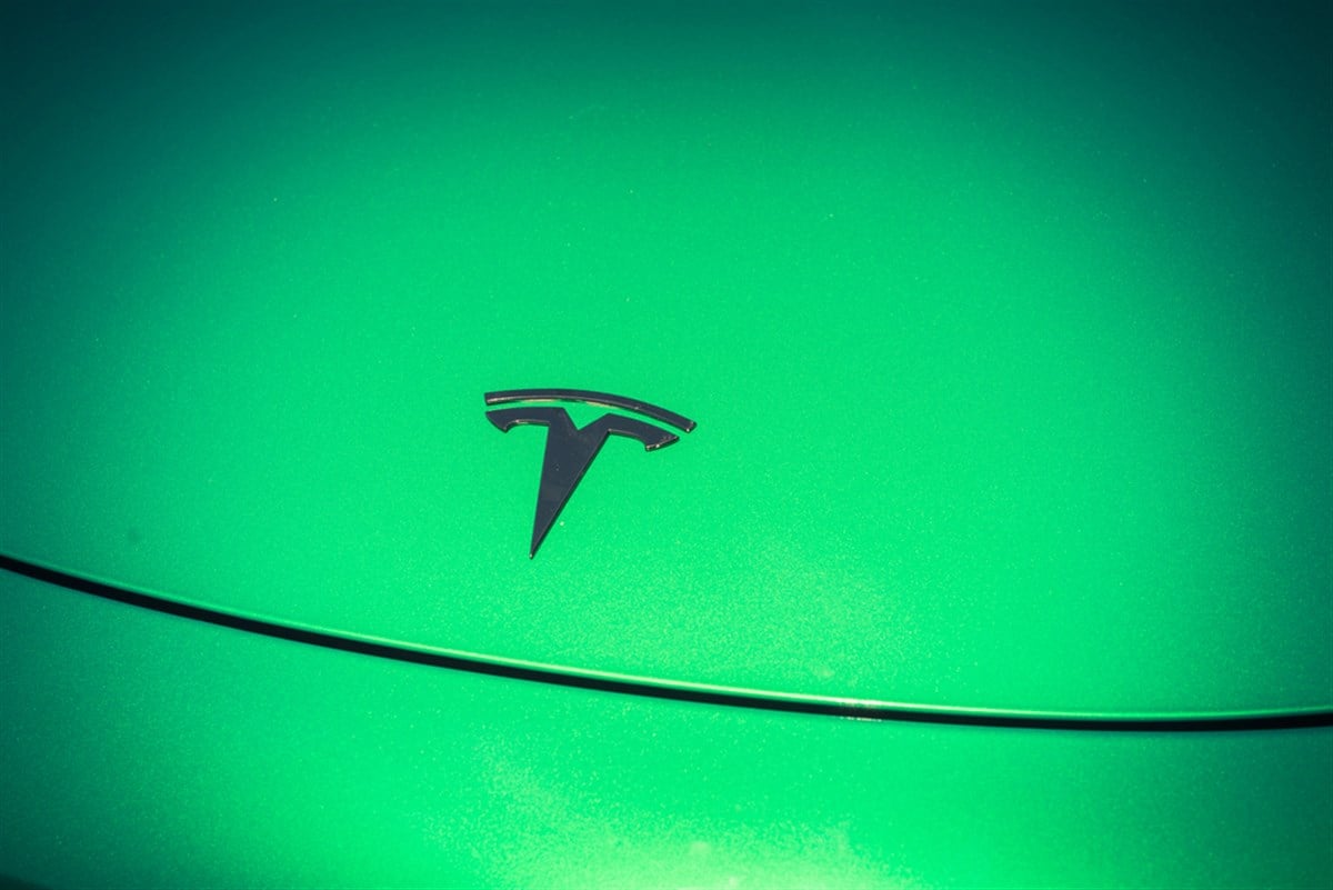 Tesla logo badge on car