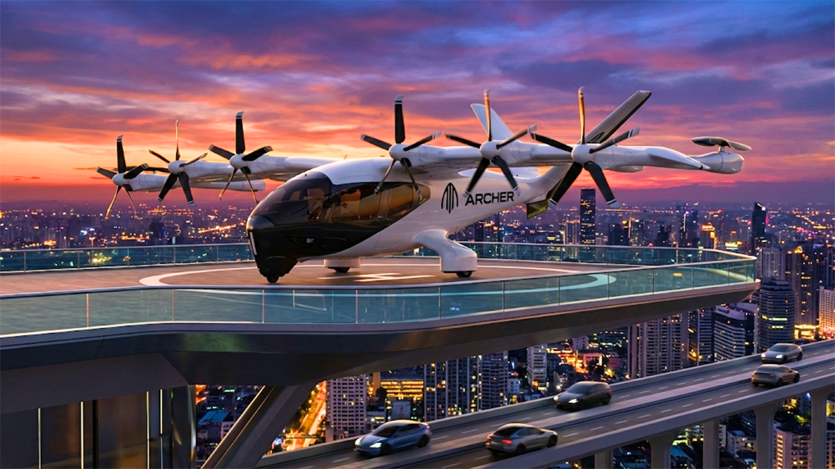 Archer Aviation eVTOL aircraft sits on a rooftop helipad at sunset, highlighting urban air mobility growth.