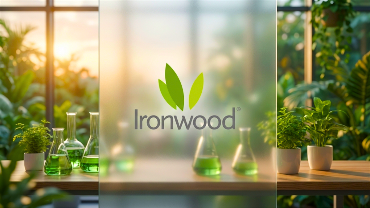 Ironwood logo appears in a green lab setting with plants and glassware, highlighting sustainable biotech research.