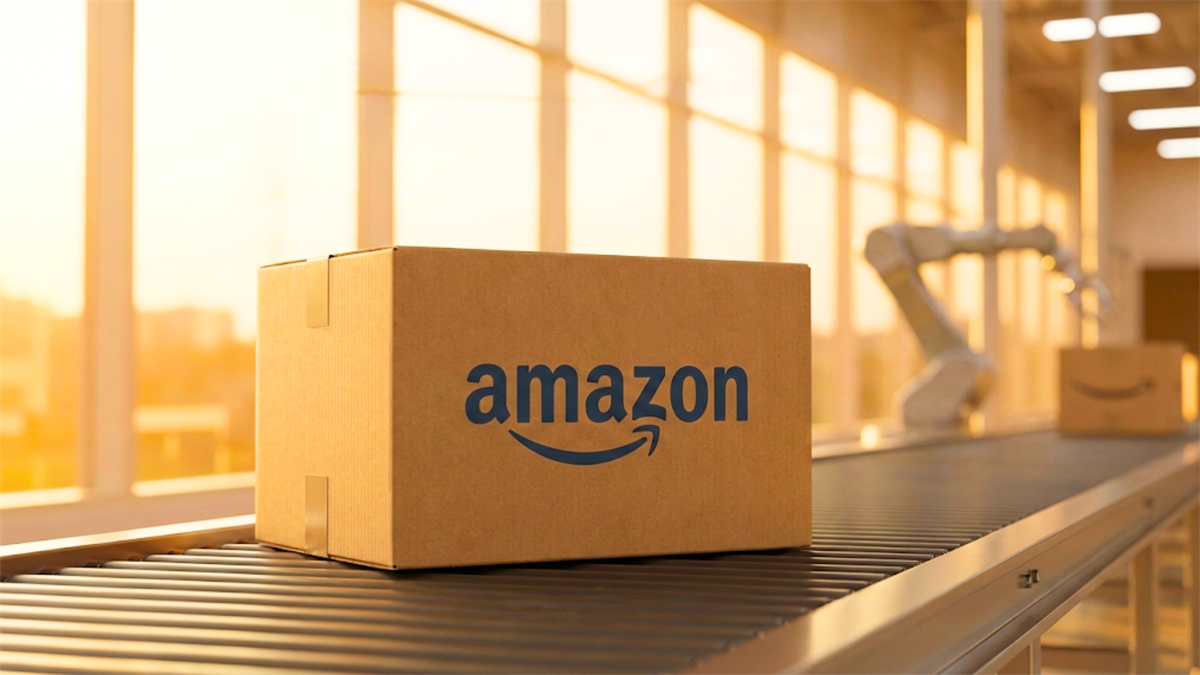 Amazon-branded package on an automated warehouse conveyor highlights e-commerce logistics.