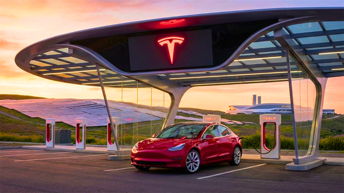 Tesla Supercharger station with a Model 3 highlights EV charging infrastructure expansion.
