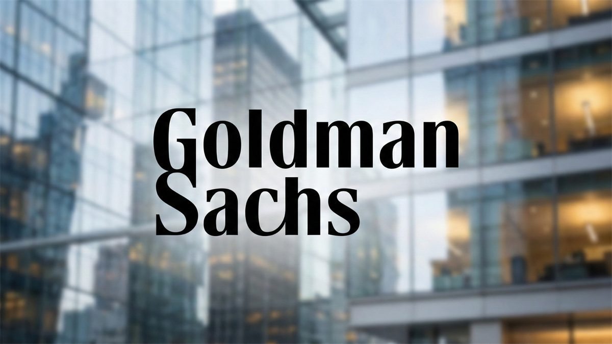Goldman Sachs logo on glass office facade, highlighting bank’s strong earnings and investment-banking momentum.