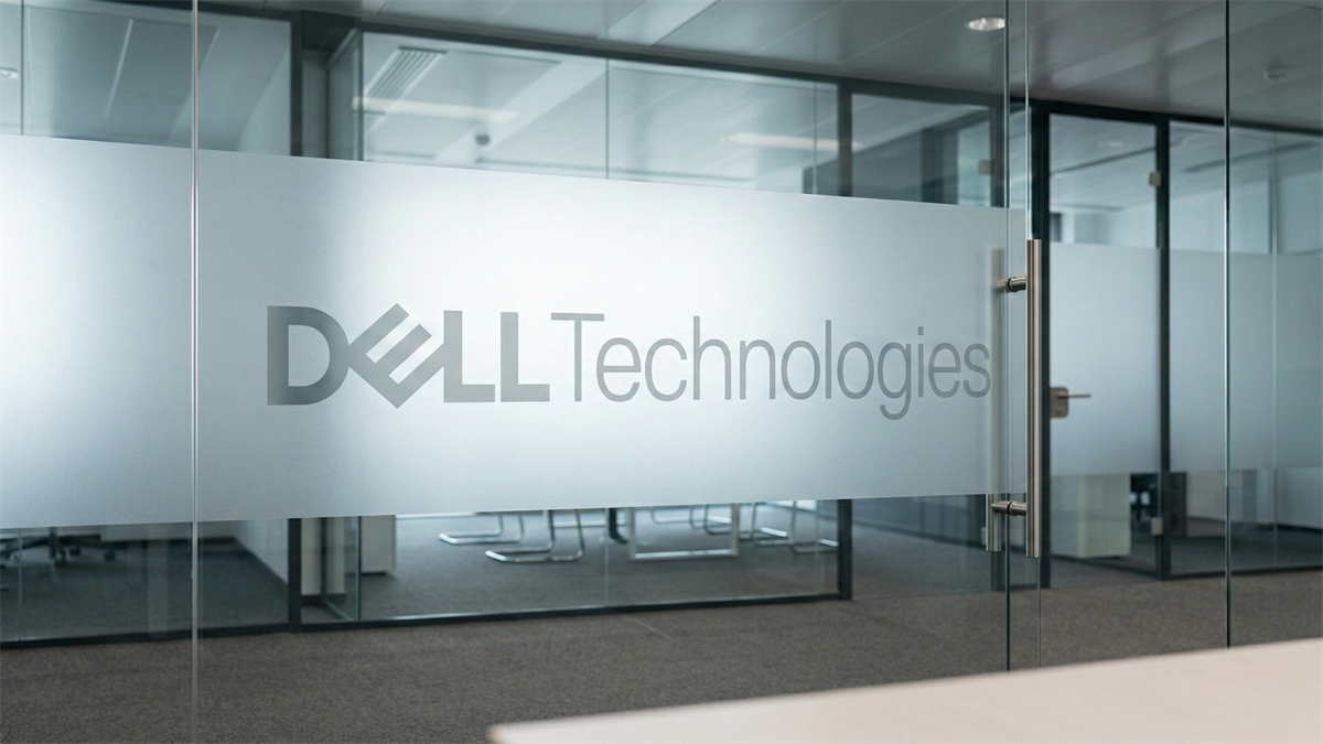 Dell Technologies logo displayed on frosted glass office door in modern corporate workspace interior