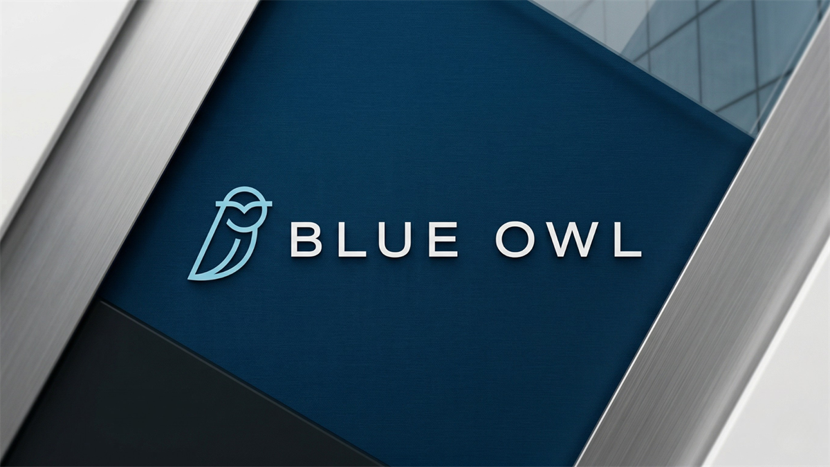 Blue Owl Capital logo on modern office wall, symbolizing private credit firm amid stock selloff concerns.