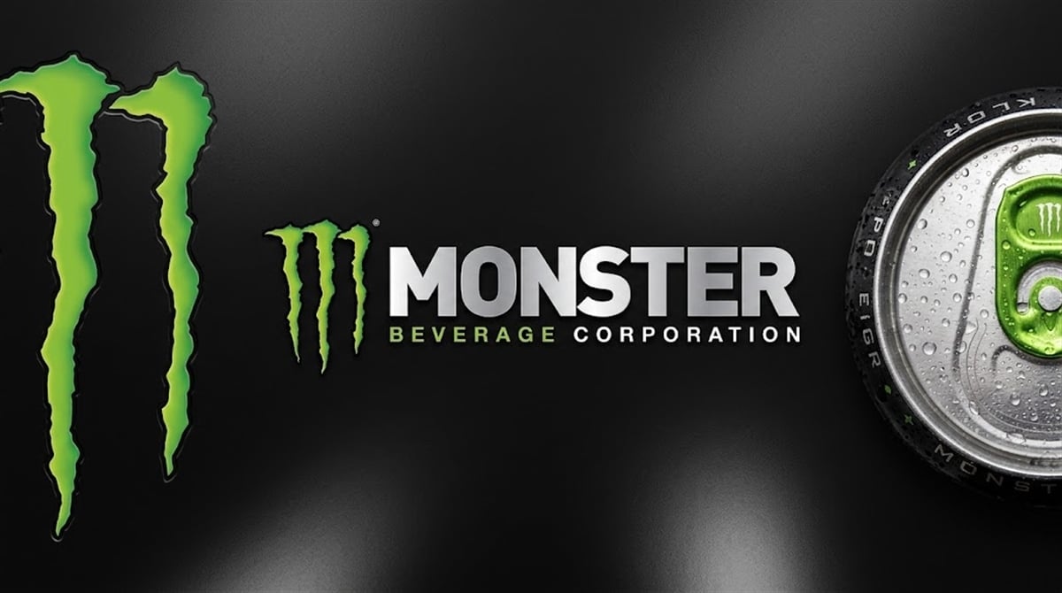 Monster Beverage Corporation logo alongside a condensation-covered Monster Energy drink can on a dark background.