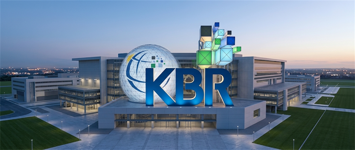 Aerial view of KBR corporate headquarters building with illuminated KBR logo and globe sculpture at dusk.