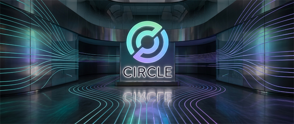 Circle logo illuminated on a display screen in a dark room with glowing teal and purple light lines.