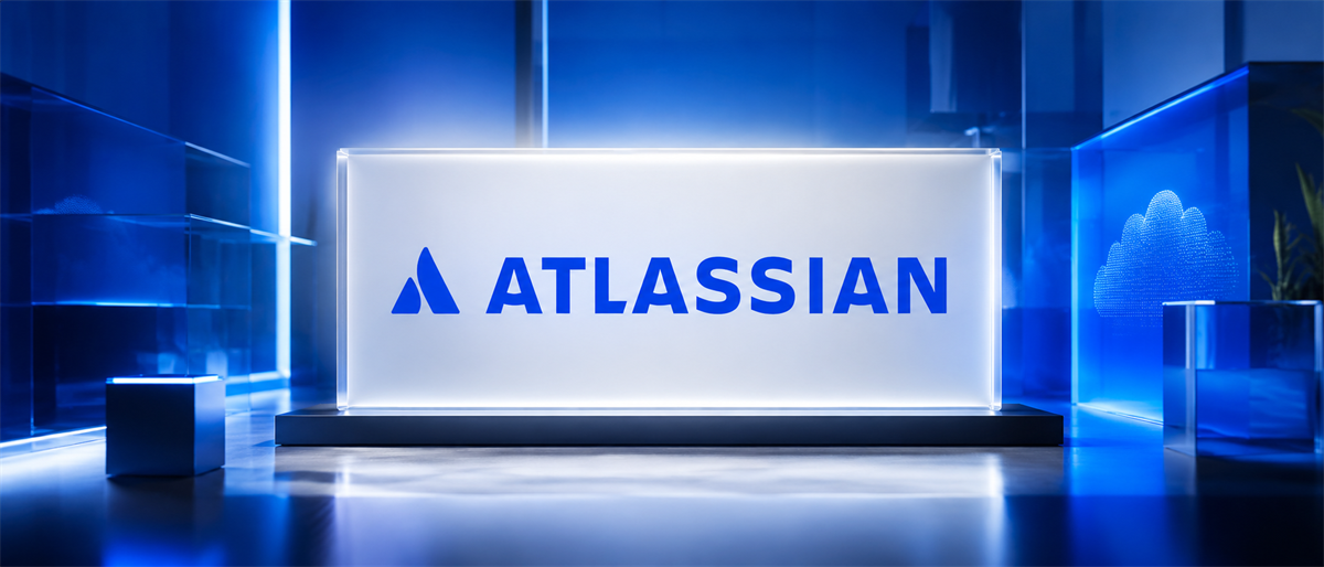 Atlassian logo displayed on an illuminated glass panel in a blue-lit setting with a cloud icon in the background.