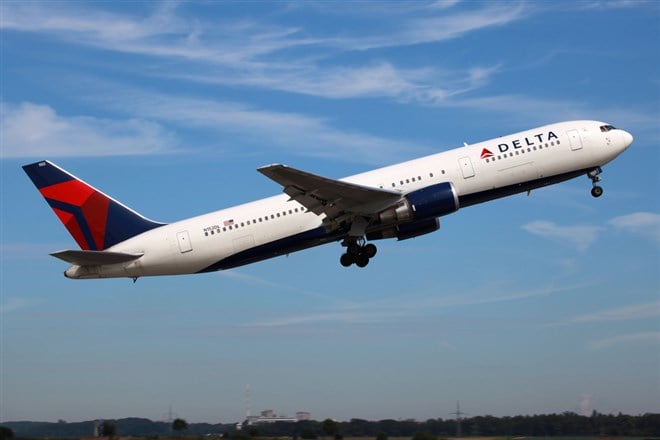 Image of Delta plane; learn more about whether you should buy Delta Air Lines stock