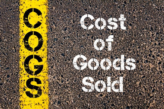 What is cost of goods sold (COGS): Image of Business Acronym COGS Cost Of Goods Sold written over road marking yellow paint line