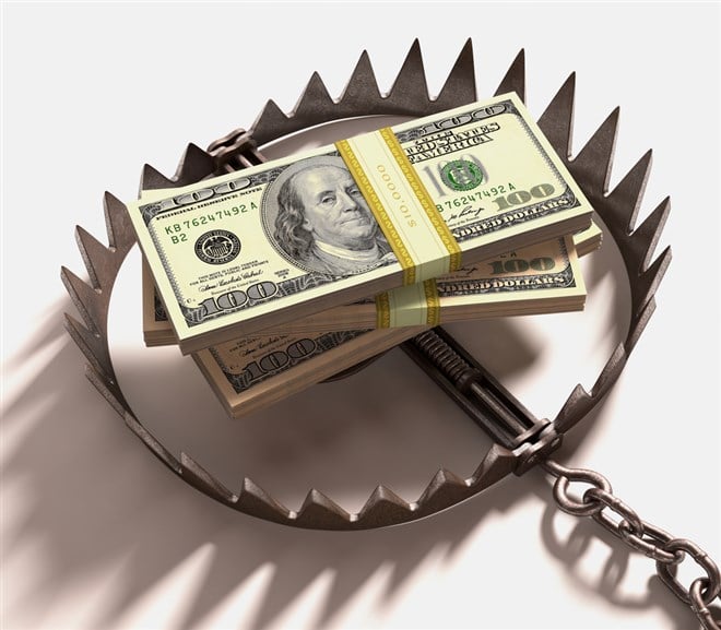 Stack of US dollars into a trap. What is a bear trap? Learn more.