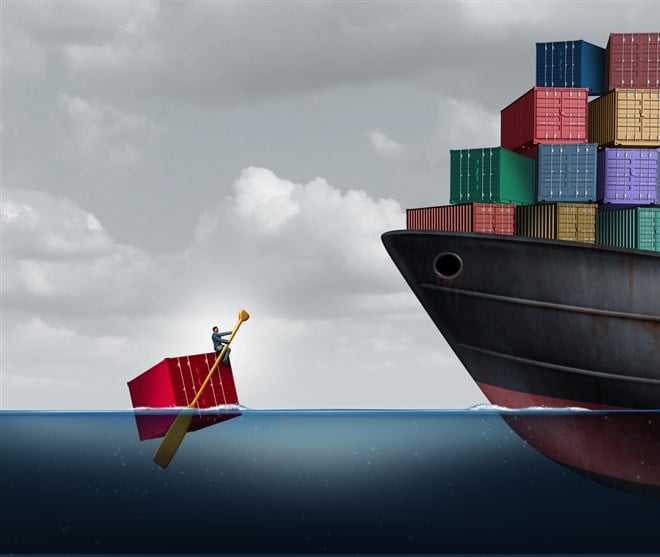 Trade deficit image of a container paddling toward a container ship. What is a trade deficit overview