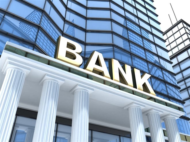 Building and sign bank; learn more about bank stocks to buy on the dip