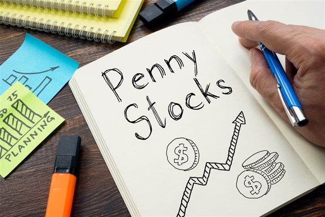 Penny Stocks are shown on a business photo using the text