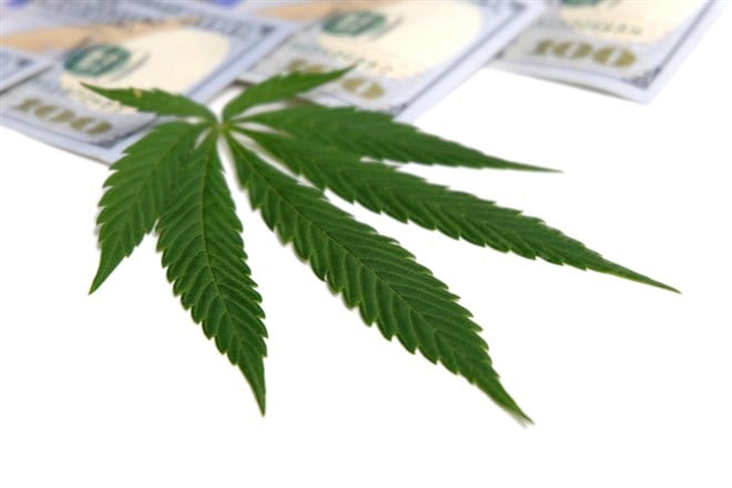 Image of cannabis and money