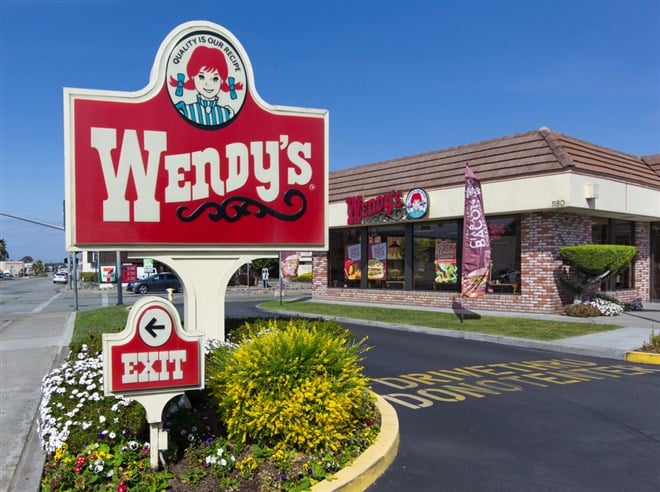Wendy's restuarant sign, Wendy's could be y our best passive income stock this cycle