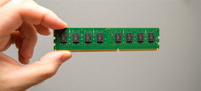 Photo of someone holding a chip produced my Micron Technology, a must-own stock for Q2