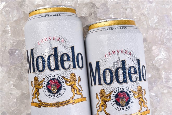 Photo shows 2 cans of Modelo, which recently bested Bud Light as Americas Favorite Beer, and helped its parent company Constellation Brands recently report bullish earnings.
