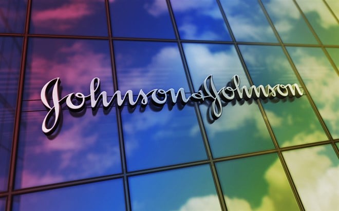 Photo showing a rainbow mirrored Johnson & Johnson building. Q1 performance was mixed, but optimism remains.