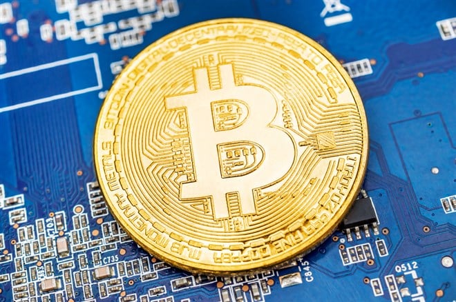Golden coins of bitcoin Crypto mining concept.
