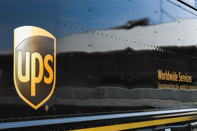 close-up photo of side of UPS delivery van
