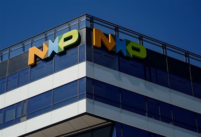 The logo of  American Dutch semiconductor manufacturer NXP Semiconductors is seen on the top of the Campus 6 office complex,