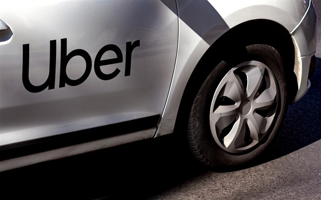 An Uber logo branded ca