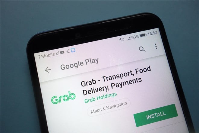  closeup photo of mobile device displaying Grab app in operation                      