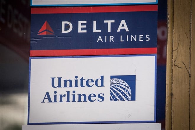 Delta and united airlines logos on airport signs