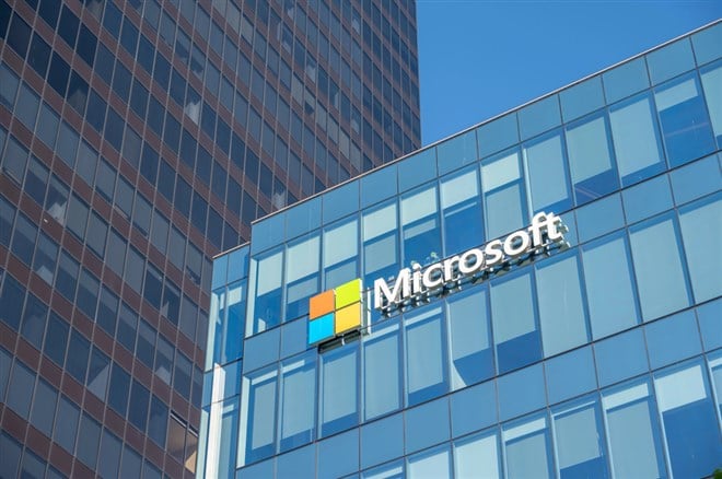 Microsoft logo on company building. 