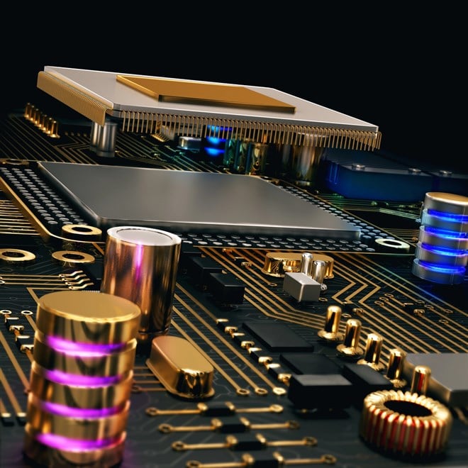 Close-up of a metallic microchip and gold circuit board components with blue lighting accents.