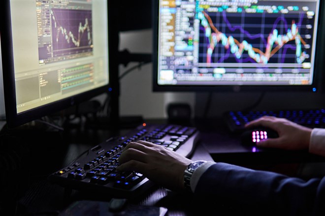 The desk of an investor in the stock market.                