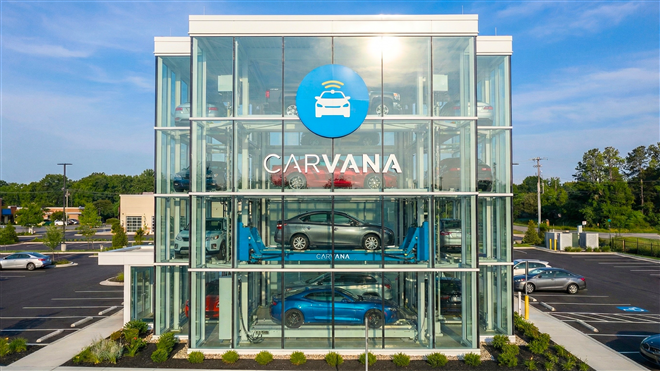 Carvana's glass car-vending tower showcases its automated used-car retail model and growing digital-auto demand.