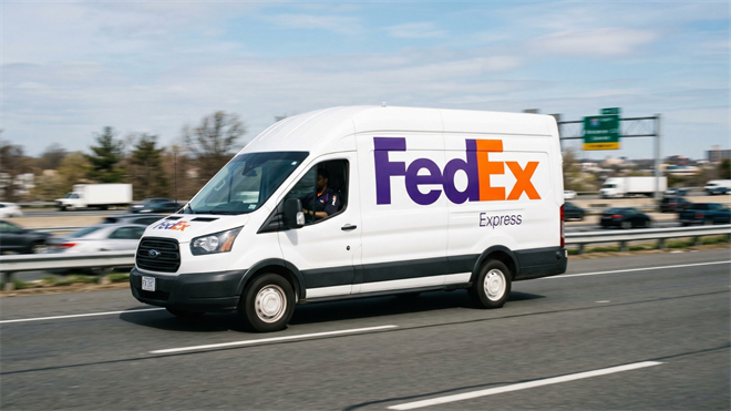 FedEx delivery van driving on highway, representing package delivery growth and strong logistics performance in 2026.