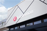 Image of Lululemon storefront; check out Lululemon earnings on MarketBeat