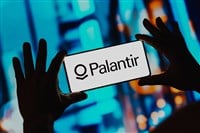 Palantir Technologies logo displayed on a smartphone, Bearish Sentiment and Bullish Signals