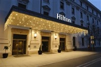 Photo of the exterior of a Hilton Hotel. Hilton Worldwide's asset-light strategy proves beneficial for investors as they deliver a solid earnings report.