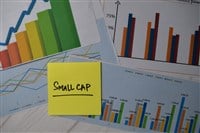 Small Cap write on sticky notes isolated on Office Desk. Stock market concept