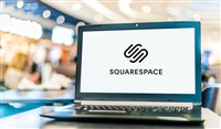 Photo of the Squarespace logo on a laptop. Squarespace acquisition indicates a recovering financial market.