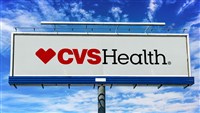 photo of CVS Health logo on sign with blue sky in background