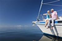 Senior couple sitting on a boat
