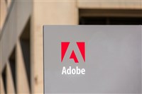 Adobe logo on signpost at Adobe Inc headquarters
