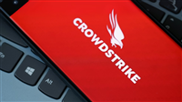 CrowdStrike logo with Window laptop
