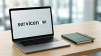 ServiceNow logo on a laptop screen on a modern office desk, illustrating AI workflow automation software.