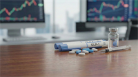 GLP-1 injection pen, pills and vial on desk with stock charts behind, signaling weight-loss drug boom.
